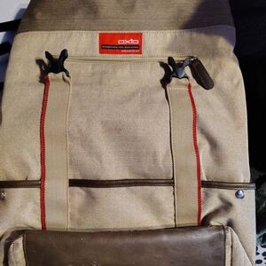 Tan and Brown Minimalist Backpack with Structured Design